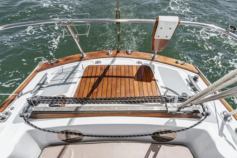 Slide: The Image of 1970 Morgan 42 MKI sailboat deck with wooden finish and ocean view. - 32