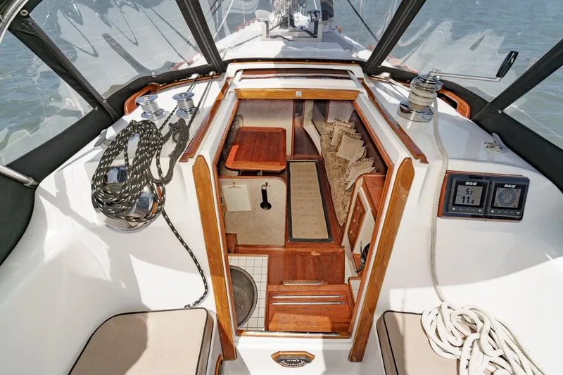 Slide: The Image of Cockpit view of 1970 Morgan 42 MKI sailboat with ropes and navigation instruments. - 34