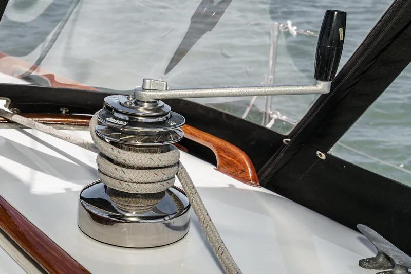 Slide: The Image of Winch on 1970 Morgan 42 MKI sailboat deck with rope and handle. - 79
