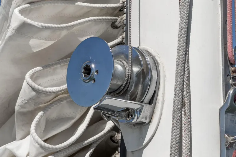 Slide: The Image of Close-up of a winch on a 1970 Morgan 42 MKI sailboat, with coiled ropes. - 85