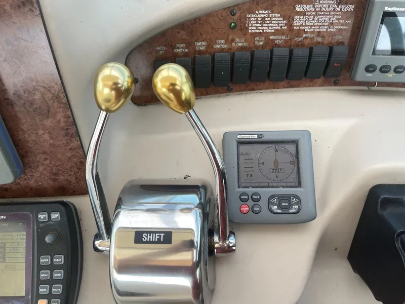Slide: The Image of Dashboard of a 1999 Sea Ray 340 Sundancer boat. - 17