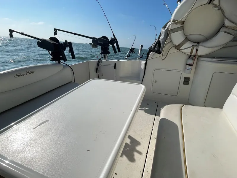Slide: The Image of Interior view of 1999 Sea Ray 340 Sundancer on the water. - 5