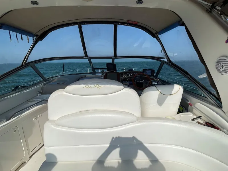 Slide: The Image of Interior view of 1999 Sea Ray 340 Sundancer yacht on the ocean. - 6