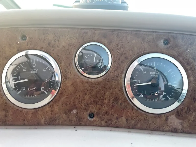 Slide: The Image of Dashboard of a 1999 Sea Ray 340 Sundancer boat. - 8
