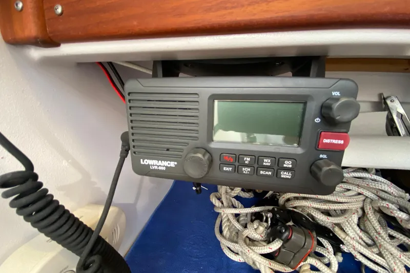 Slide: The Image of VHF marine radio Lowrance LVR-880 on 2013 Devlin Onyx boat, with coiled cables. - 29