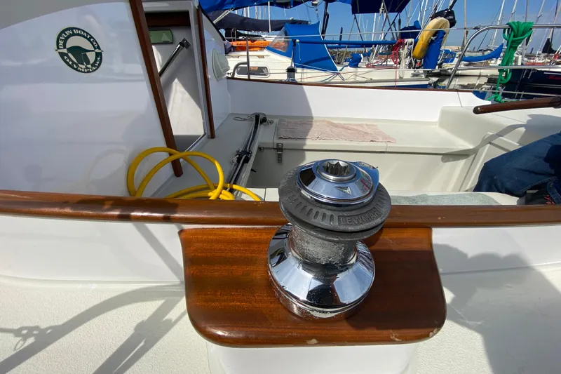 Slide: The Image of Deck of 2013 Devlin Onyx boat with winch and yellow hose. - 5