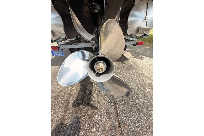 Slide: The Image of Close-up of a 2026 Coach 243 boat propeller on a trailer. - 26