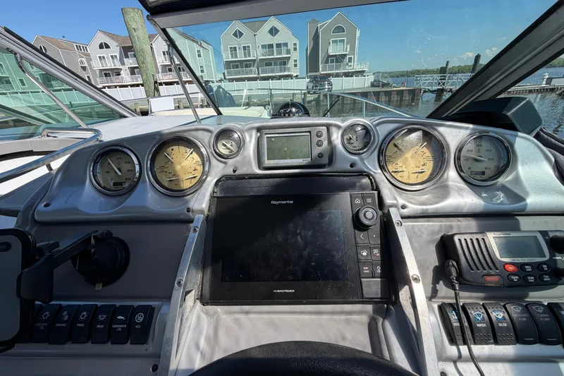 Slide: The Image of Cockpit view of a 2007 Monterey 330 Sport Yacht with navigation instruments. - 25