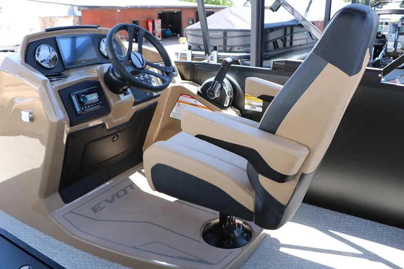 Slide: The Image of 2026 Evotti 521CS boat cockpit with modern steering and comfortable captain's chair. - 32