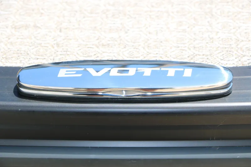 Slide: The Image of Chrome Evotti logo on 2026 Evotti 521CS vehicle, showcasing sleek design. - 46