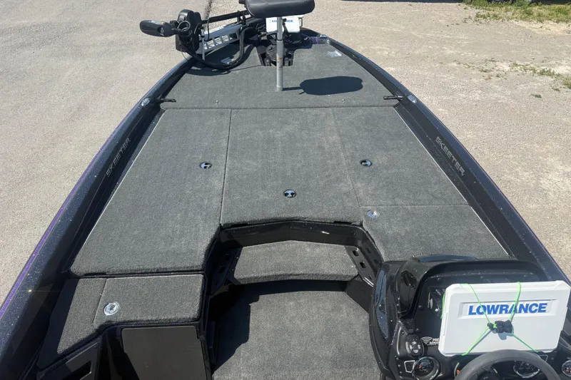 Slide: The Image of 2025 Skeeter ZXR21 boat deck with Lowrance electronics and trolling motor. - 10