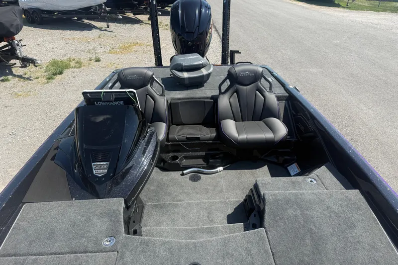 Slide: The Image of 2025 Skeeter ZXR21 boat interior with sleek seating and advanced navigation system. - 14