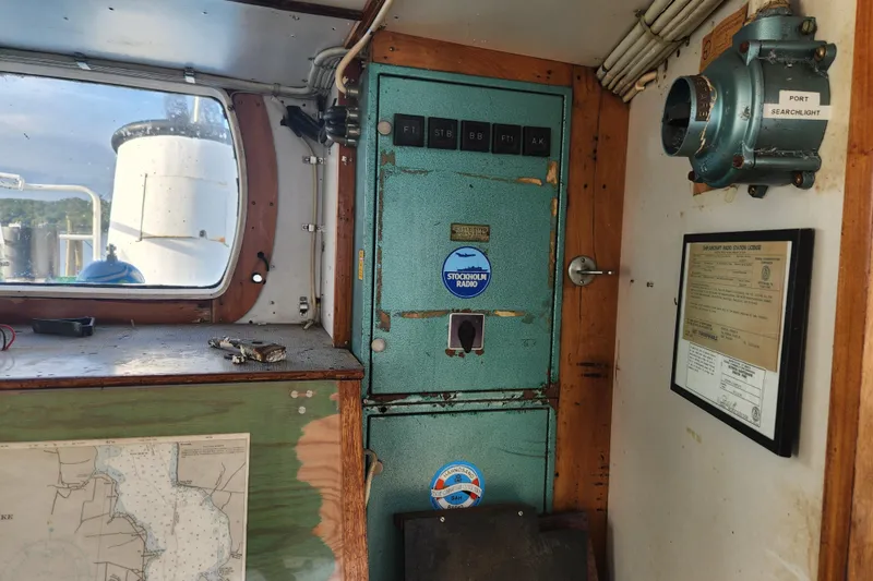 Slide: The Image of Interior of a 1960 Vintage Stord Verft 60 ship with control panel and map. - 101