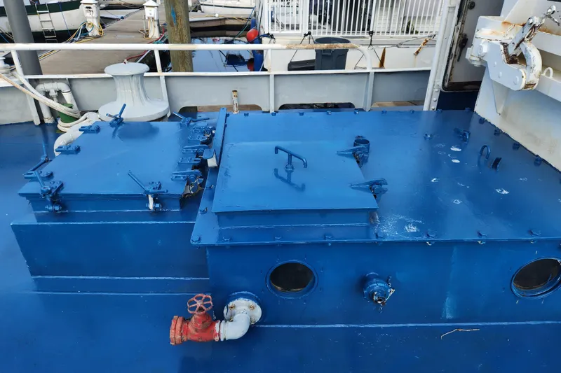 Slide: The Image of Blue deck of a 1960 Stord Verft 60 ship with hatches and valves. - 28