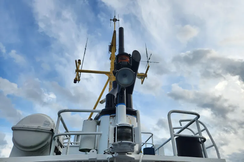 Slide: The Image of Antenna and equipment on Stord Verft 60 ship, 1960, against cloudy sky. - 31