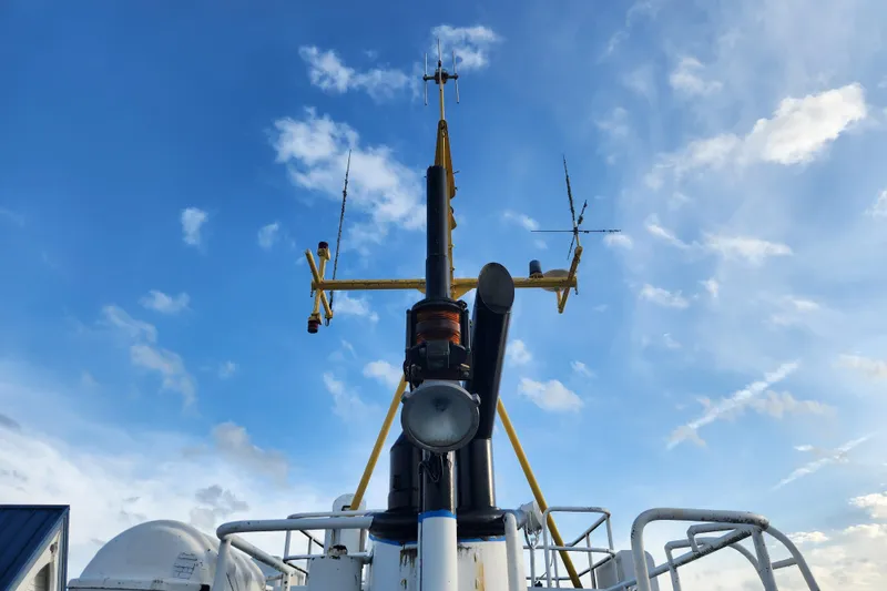 Slide: The Image of Antenna and equipment on Stord Verft 60 ship, 1960, against a blue sky. - 34