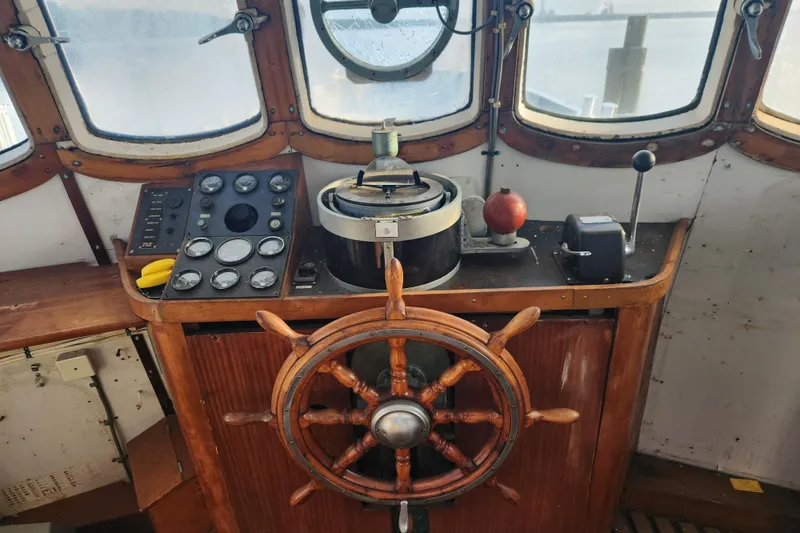 Slide: The Image of Vintage ship helm with wooden wheel and control panel, Stord Verft 60, 1960 model. - 41