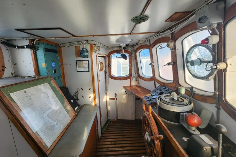 Slide: The Image of Vintage 1960 Stord Verft ship interior with navigation equipment and wooden accents. - 42