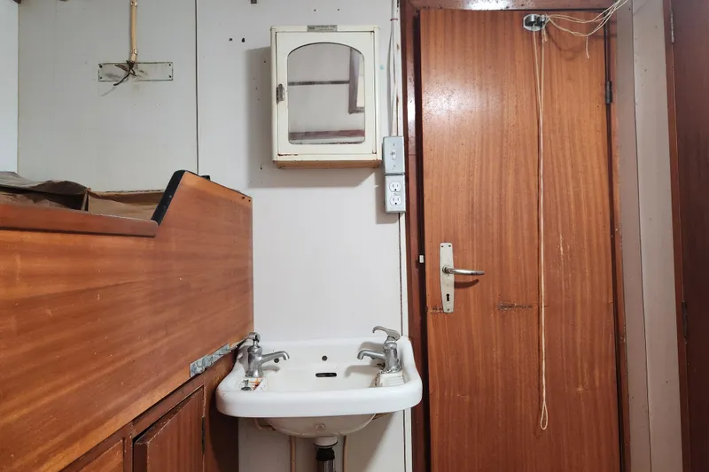 Slide: The Image of Wooden interior with sink and cabinet, Stord Verft 60, 1960 vintage design. - 62