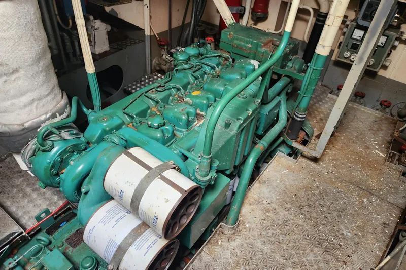 Slide: The Image of Engine room featuring a vintage 1960 Stord Verft model 60 marine engine. - 83
