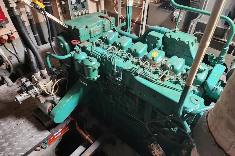 Slide: The Image of Vintage Stord Verft 60 engine from 1960 in a mechanical room setting. - 84