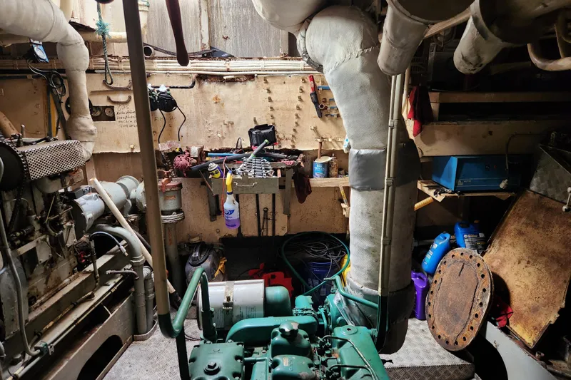 Slide: The Image of Engine room of a 1960 Stord Verft model 60 vessel, showcasing machinery and tools. - 85