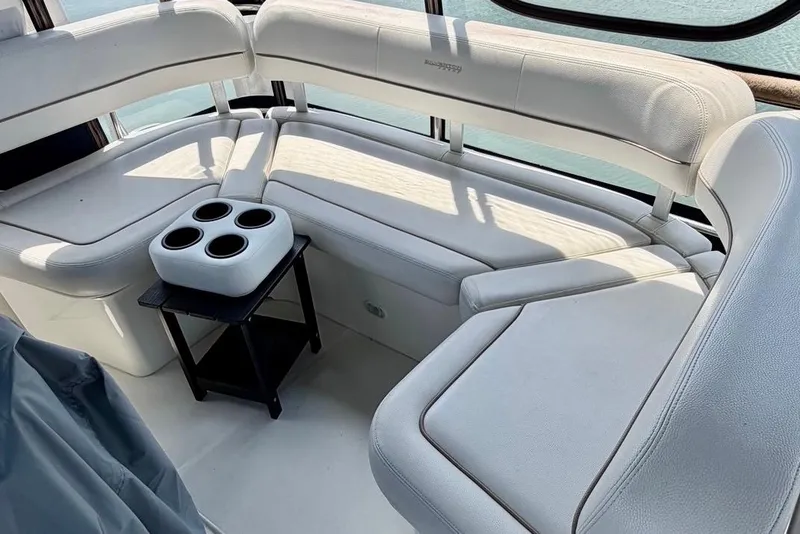 Slide: The Image of Luxurious seating area on a 2007 Silverton 36 Convertible yacht with cup holders. - 14