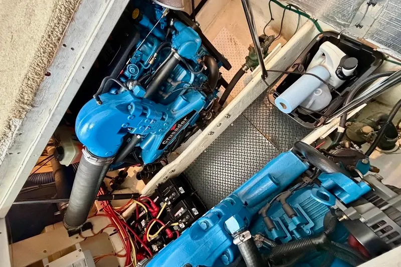 Slide: The Image of Engine room of a 2007 Silverton 36 Convertible with blue Crusader engines. - 17