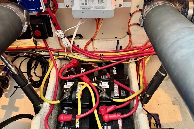 Slide: The Image of Engine room of 2007 Silverton 36 Convertible with batteries and wiring. - 21