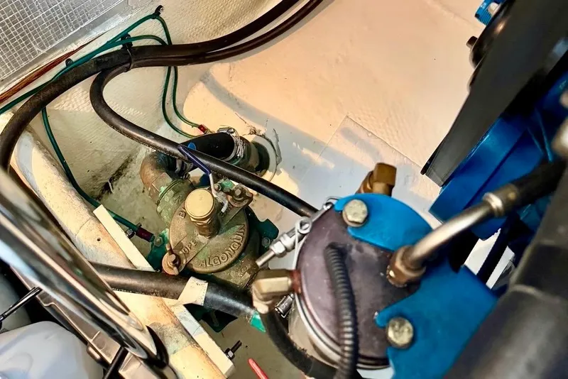 Slide: The Image of Engine compartment of a 2007 Silverton 36 Convertible boat, showing mechanical components. - 22
