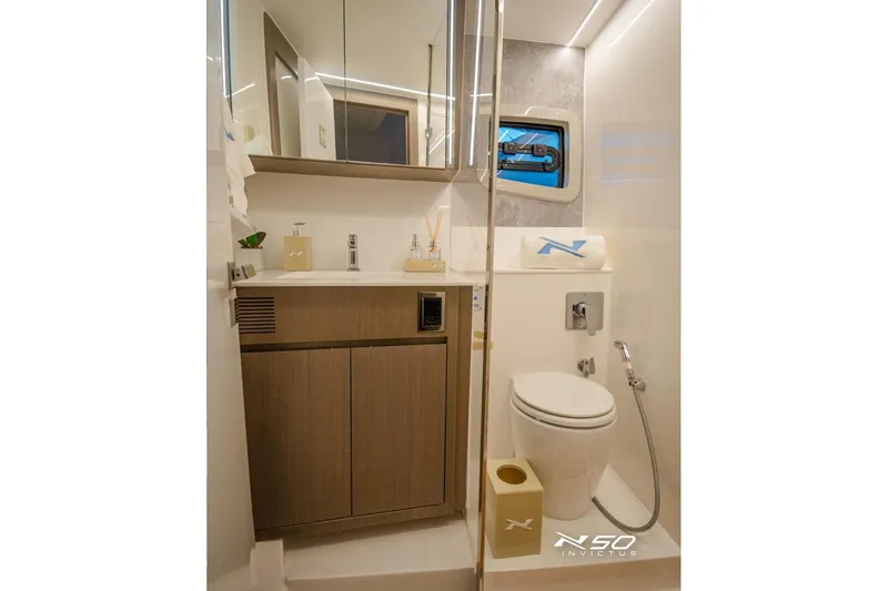 Slide: The Image of Luxurious bathroom interior of 2025 NX Boats NX50 Invictus HT yacht, featuring modern amenities. - 7