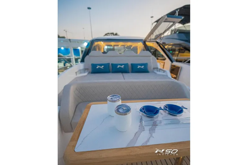 Slide: The Image of Luxurious 2025 NX Boats NX50 Invictus HT interior with elegant seating and stylish accessories. - 9
