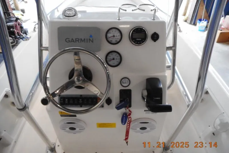 Slide: The Image of Center console of 2022 Key West 1720 boat with Garmin navigation system. - 16