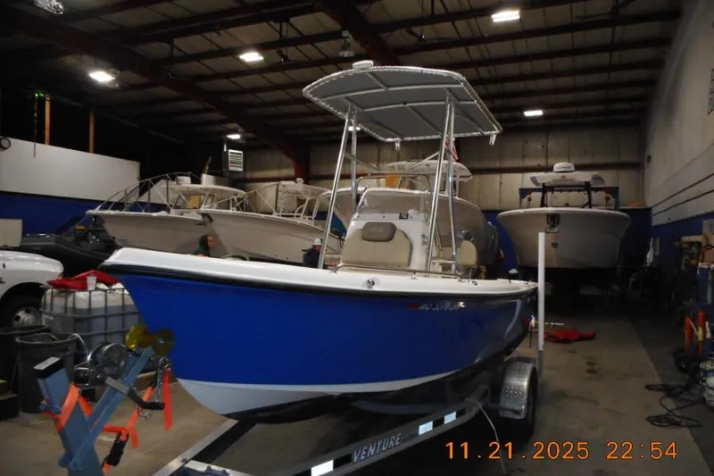 Slide: The Image of 2022 Key West 1720 Center Console boat in a storage facility. - 4