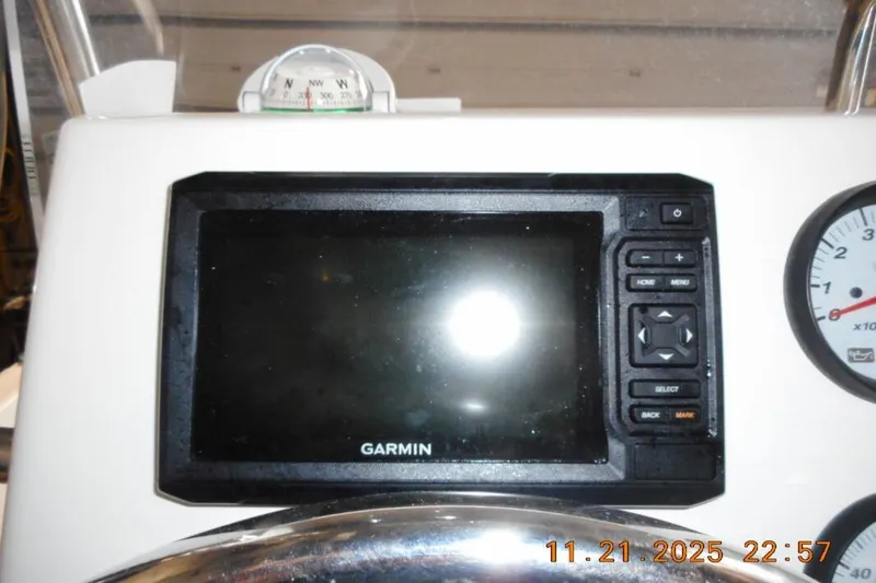 Slide: The Image of Garmin navigation system on 2022 Key West 1720 Center Console boat dashboard. - 6