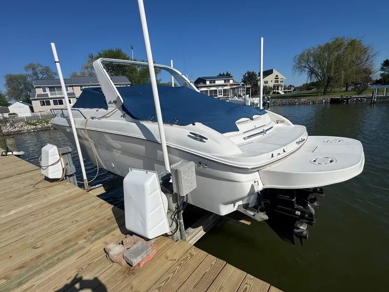 The Image of 2021 Sea Ray 280 Sun Sport boat docked on a sunny day. - 0
