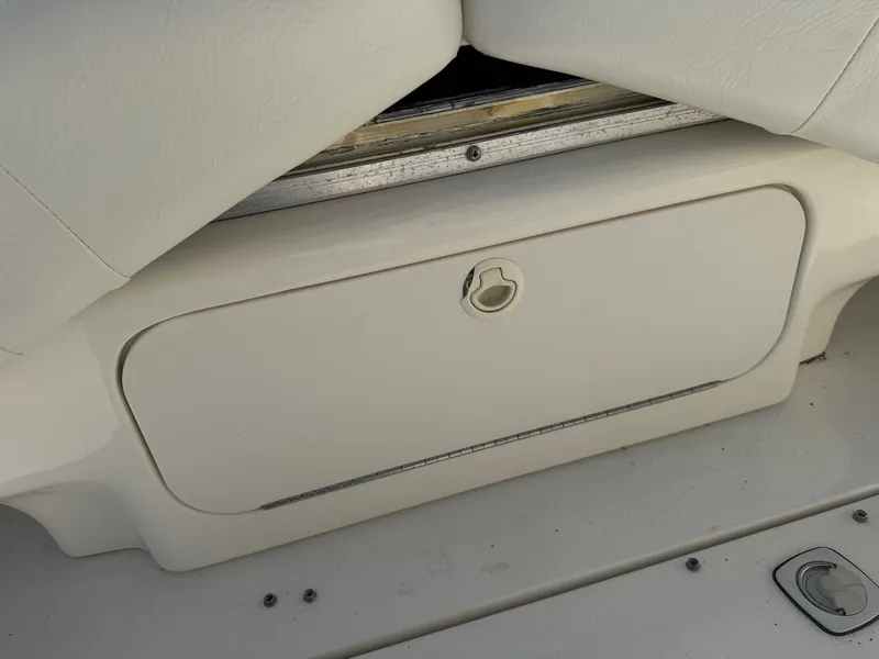 Slide: The Image of Storage compartment on a 2021 Sea Ray 280 Sun Sport boat. - 12