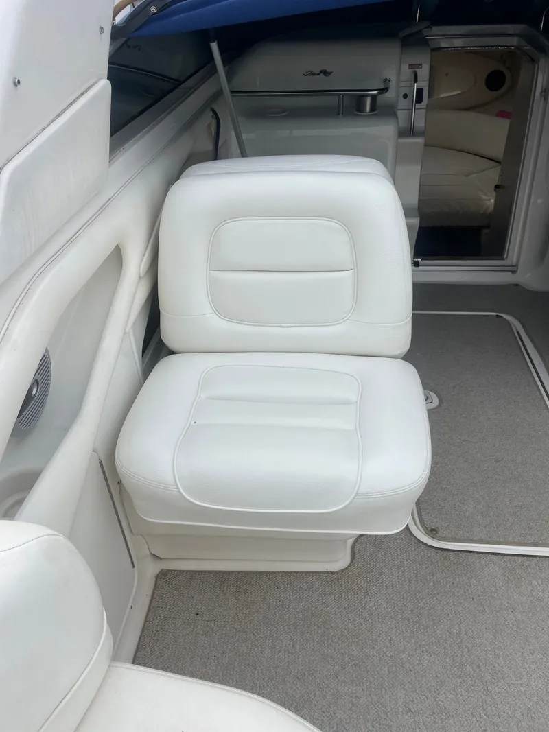 Slide: The Image of Interior of a 2021 Sea Ray 280 Sun Sport with white seating. - 15