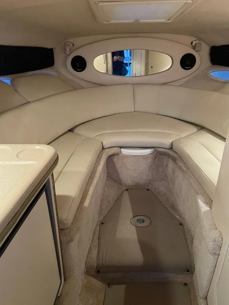 Slide: The Image of Interior of 2021 Sea Ray 280 Sun Sport with beige upholstery. - 19