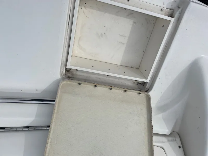 Slide: The Image of Storage compartment on a 2021 Sea Ray 280 Sun Sport boat. - 27