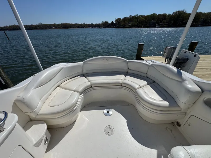 Slide: The Image of Interior of 2021 Sea Ray 280 Sun Sport with white seating area. - 36