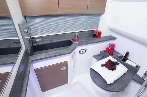 Slide: The Image of Luxurious bathroom in 2019 Formula 430 Super Sport Crossover yacht, featuring modern fixtures and sleek design. - 24