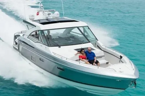Slide: The Image of 2019 Formula 430 Super Sport Crossover cruising on clear blue water. - 5