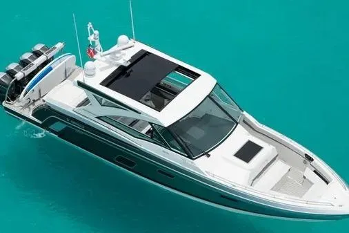 Slide: The Image of 2019 Formula 430 Super Sport Crossover yacht on turquoise water. - 6