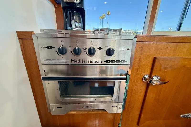 Slide: The Image of Stainless steel Mediterranean oven on 1980 Roughwater 41 boat interior. - 25
