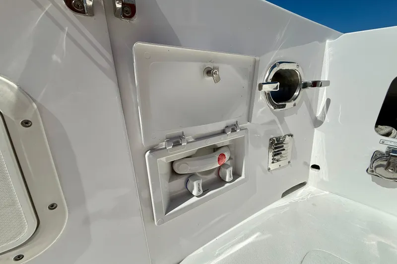 Slide: The Image of 1980 Roughwater 41 boat deck with storage compartments and fixtures. - 54