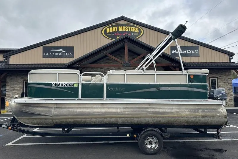 The Image of 2011 South Bay 420 CR pontoon boat on trailer at Boat Masters dealership. - 1