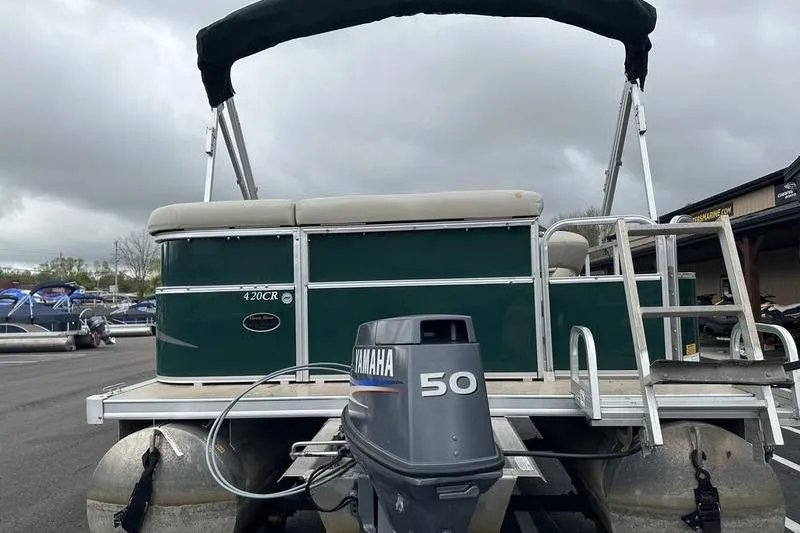 Slide: The Image of 2011 South Bay 420 CR pontoon boat with Yamaha 50 outboard motor. - 11