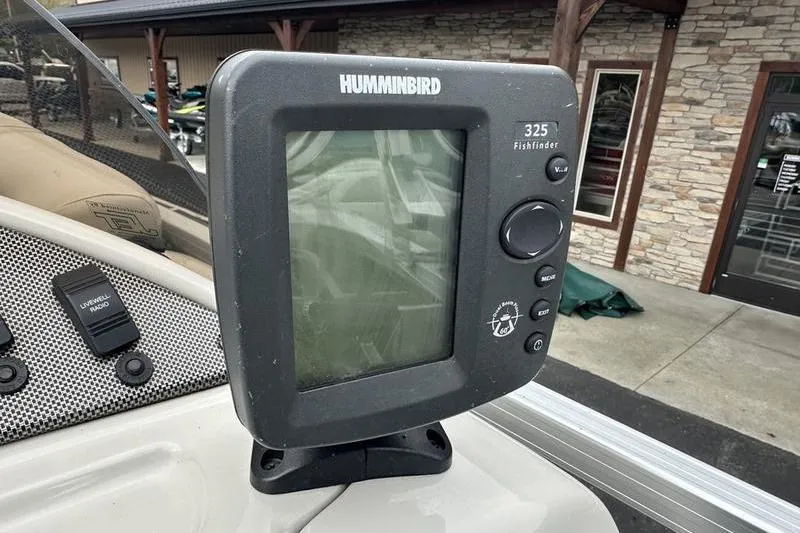 Slide: The Image of Humminbird 325 Fishfinder on 2011 South Bay 420 CR boat dashboard. - 14