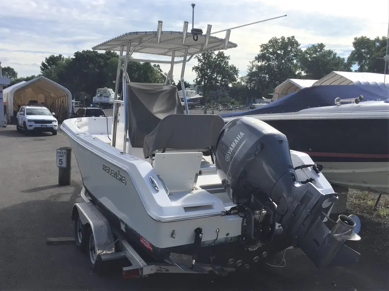 The Image of 2016 Release 208 RX boat with Yamaha outboard motor on trailer. - 0